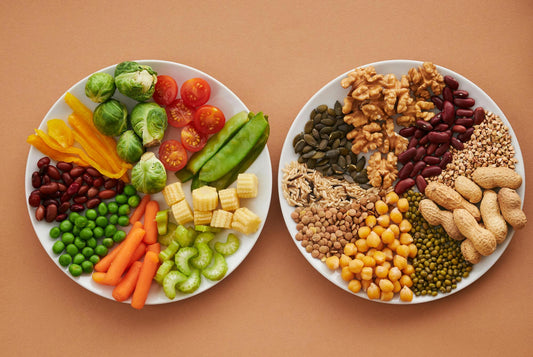 A variety of colorful fruits, vegetables, nuts, and seeds representing natural sources of vitamins and minerals