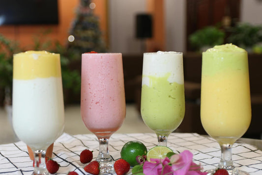 A variety of colorful smoothies in glasses